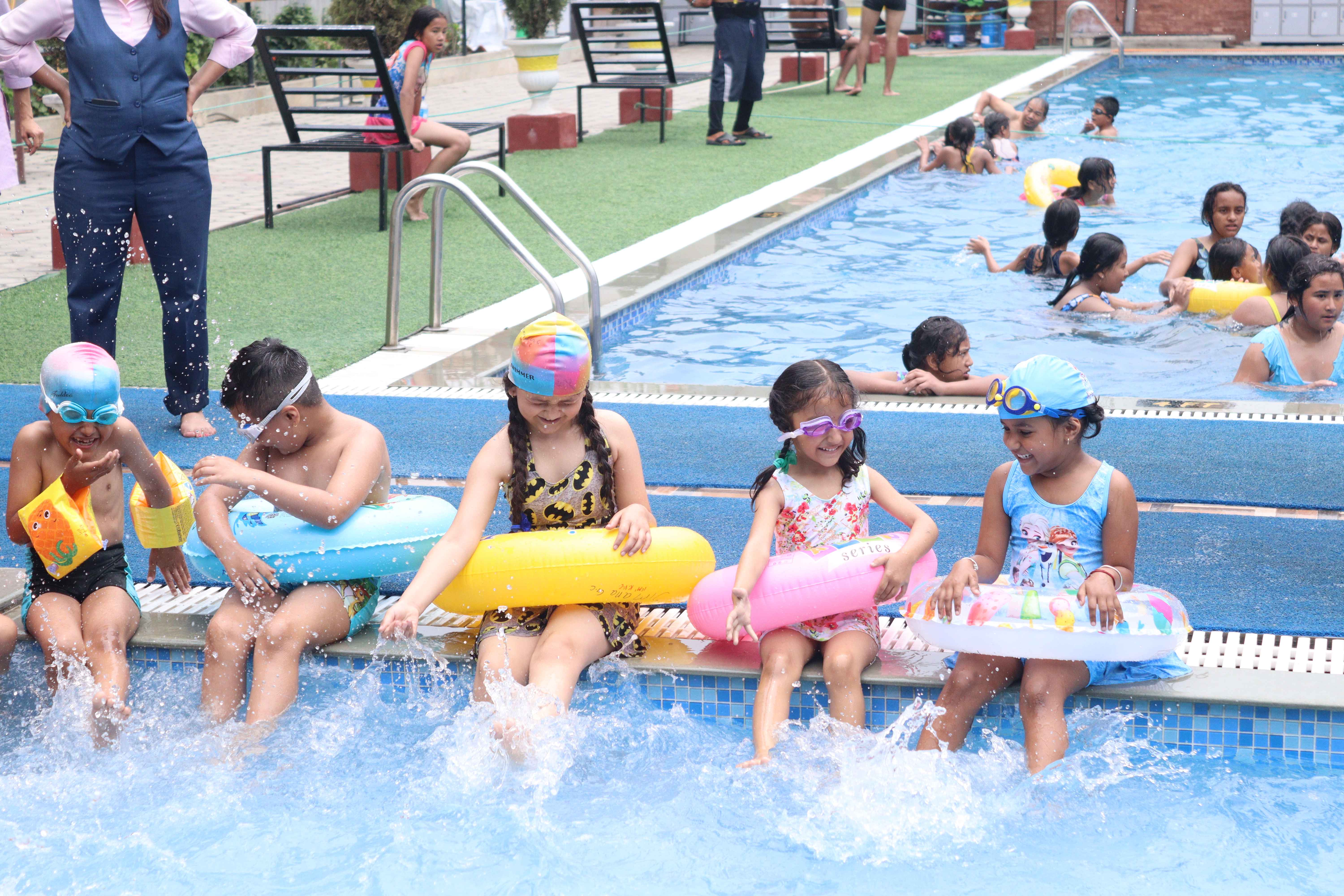 children are swimming