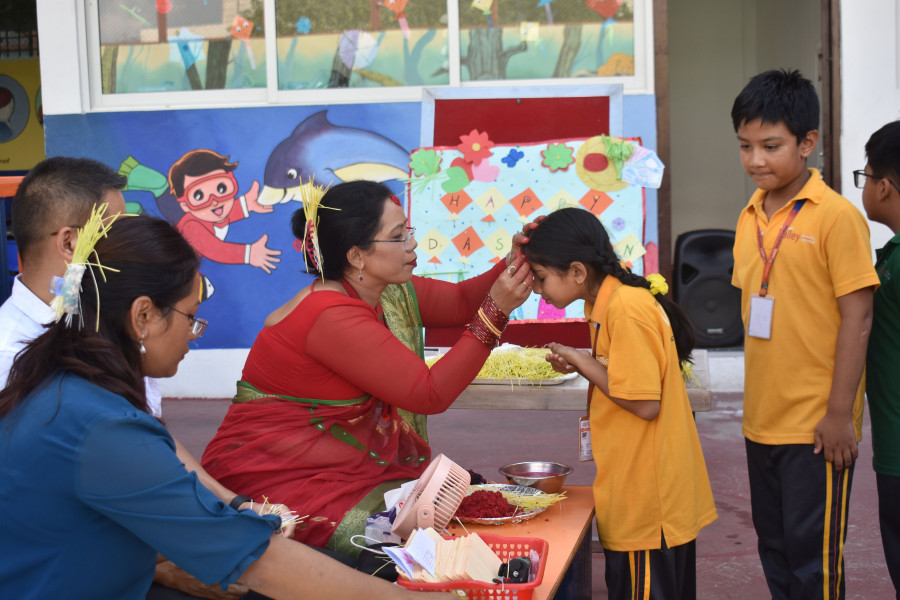 Students participating in Dashain cultural celebration at school